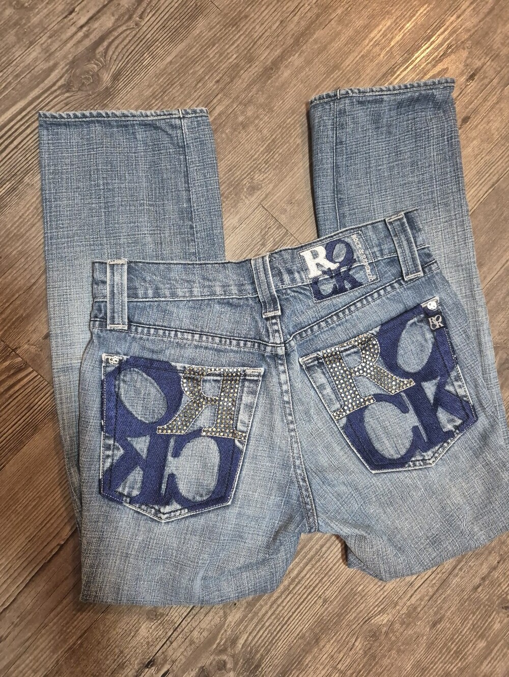 Rock & Republic Light Blue Bootcut Jeans with Embellished Logo Pockets